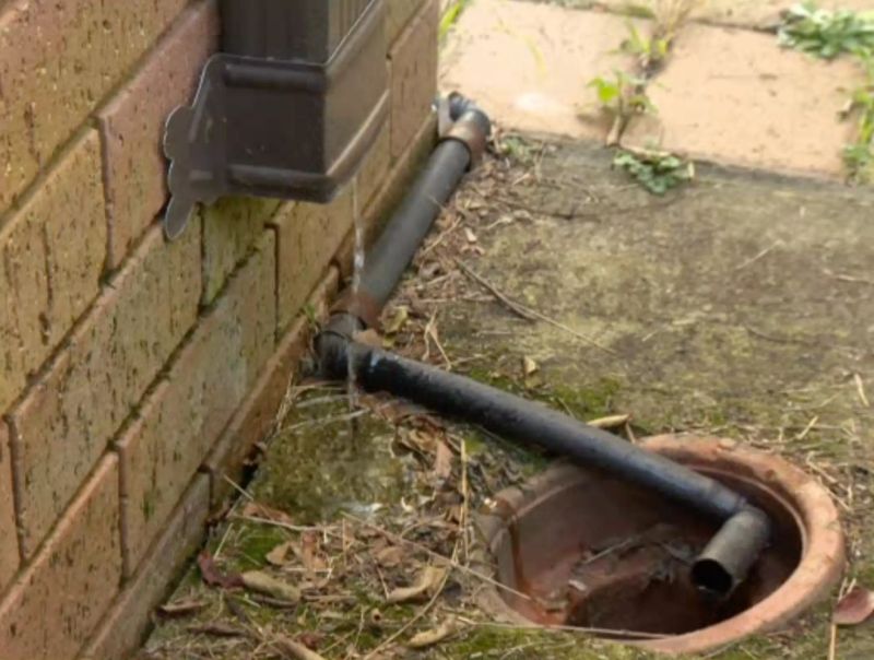 termite safe garden - downpipes need to go into drains